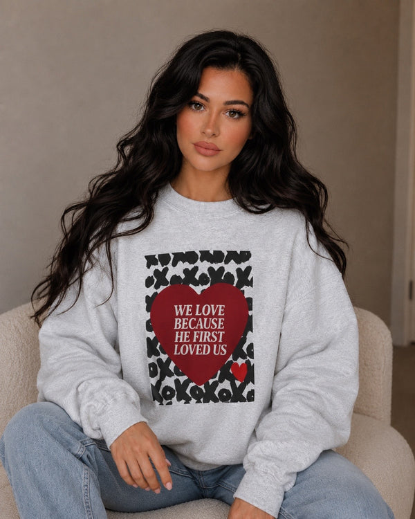 WE LOVE BECAUSE HE FIRST LOVED US Christian Crewneck Sweatshirt | 1 John 4:19 Faith Graphic